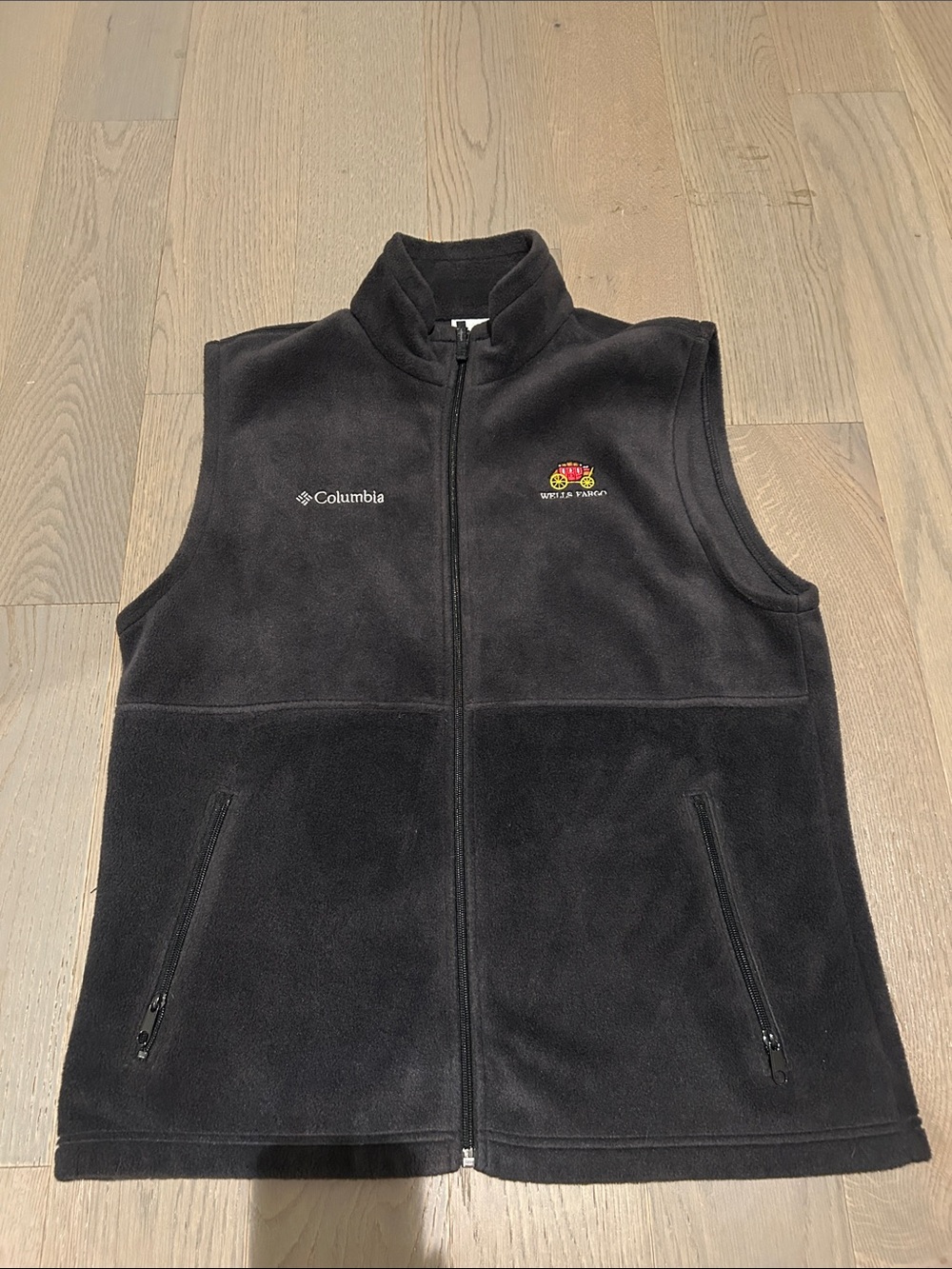 Columbia Black Menโs Fleece Vest with Wellโs Fargo Embroidered Logo
